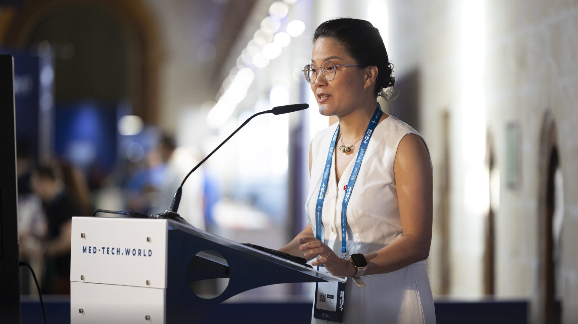 Dr. Quy Vo-Reinhard, Co-Founder and Director of dHealth, moderating on stage at the MedTech Malta 2023