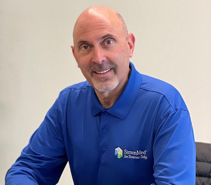 Dr. John Simon, CEO and Founder of SimonMed