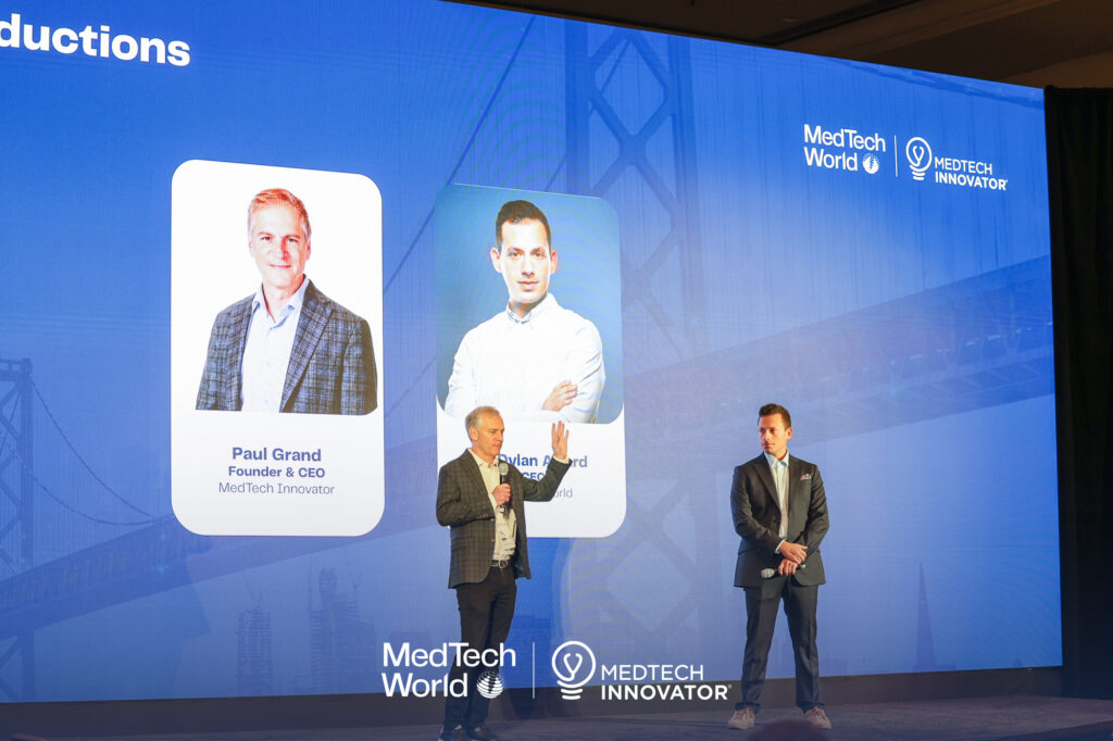 Paul Grand, CEO, MedTech Innovator, and Dr. Dylan Attard, CEO, MedTech World, on stage welcoming the attendees