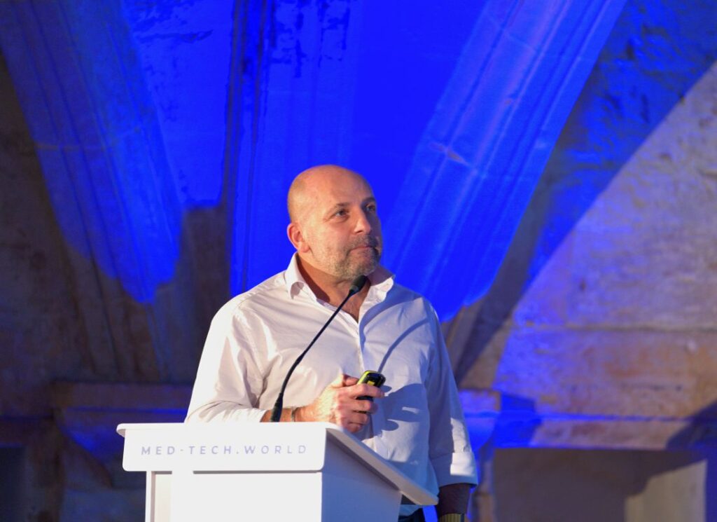Roger Assaker, Co-founder and CEO of MDsim, pitching on stage during MedTech Malta 2024