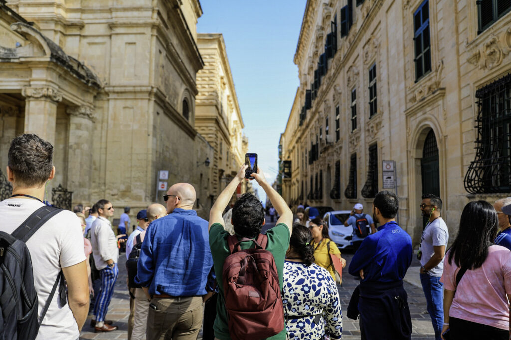 Attendees exploring Valletta’s historic streets during the cultural tour at MedTech Malta 2024