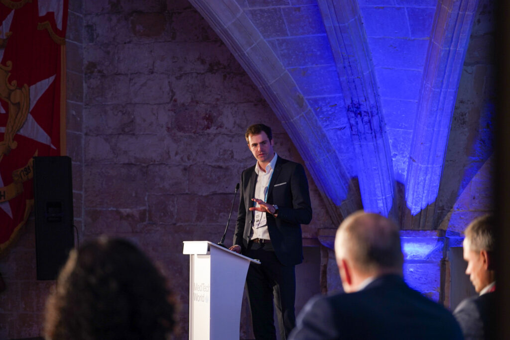 John Brumfield, Chief Executive Officer, Berlin Heals Holding AG, pitching on stage during MedTech Malta 2024