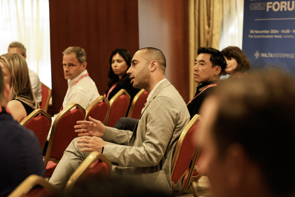 An investor engaging in a candid conversation during MedTech Malta 2024 Investor-Only Forum