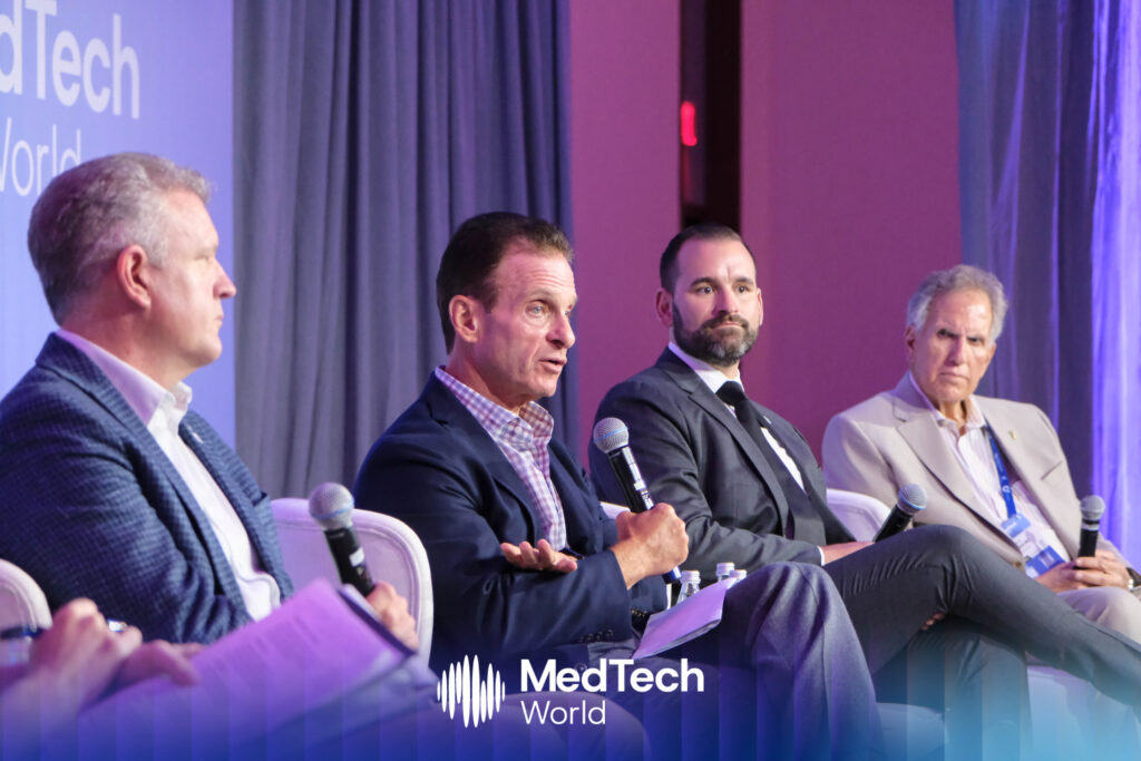 Panelists on stage discussing the Florida advantage